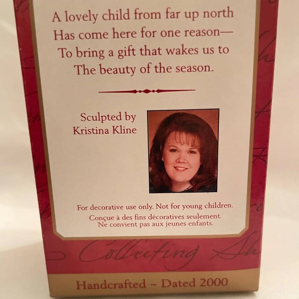 Hallmark Ornament - Girl in Teal and White with Red Accents. EUC in original box